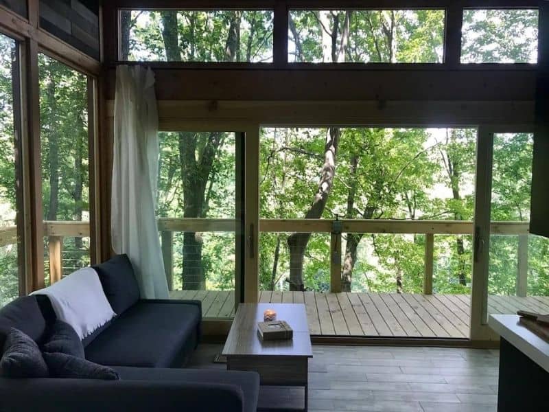 Living area at a romantic treehouse cabin in hocking hills that's pet friendly