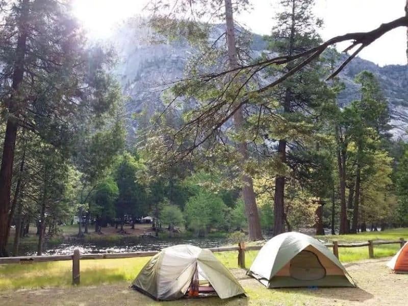 Tents along the river at Lower Pines Campground in Yosemite Valley