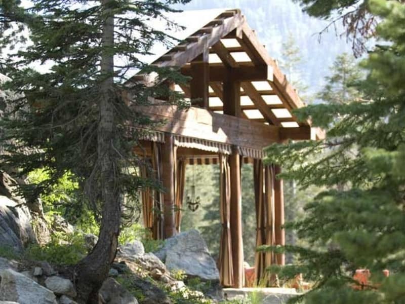 Open-air wooden pavilion with forest views at Sequoia High Sierra Camp in Sequoia National Park.