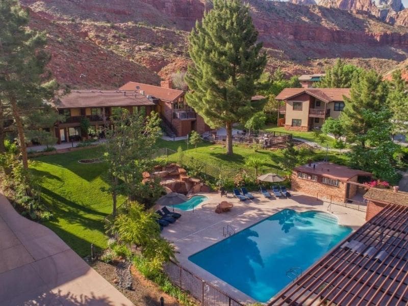 Pool and exterior of Cliffrose Springdale by Hilton near Zion National Park