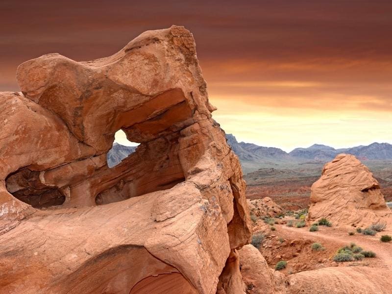 Red rock formation near a dirt trail in Valley of Fire State Park near Las Vegas