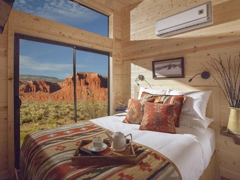 Bed in room at Capitol Reef Resort in Torrey Utah overlooking Capitol Reef National Park