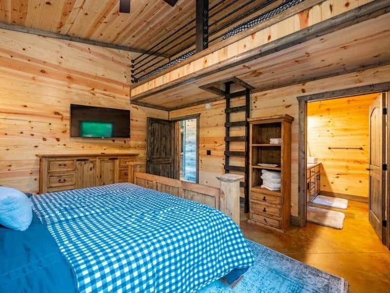 Bedroom with loft twins at Broken Bow Luxury Cabin
