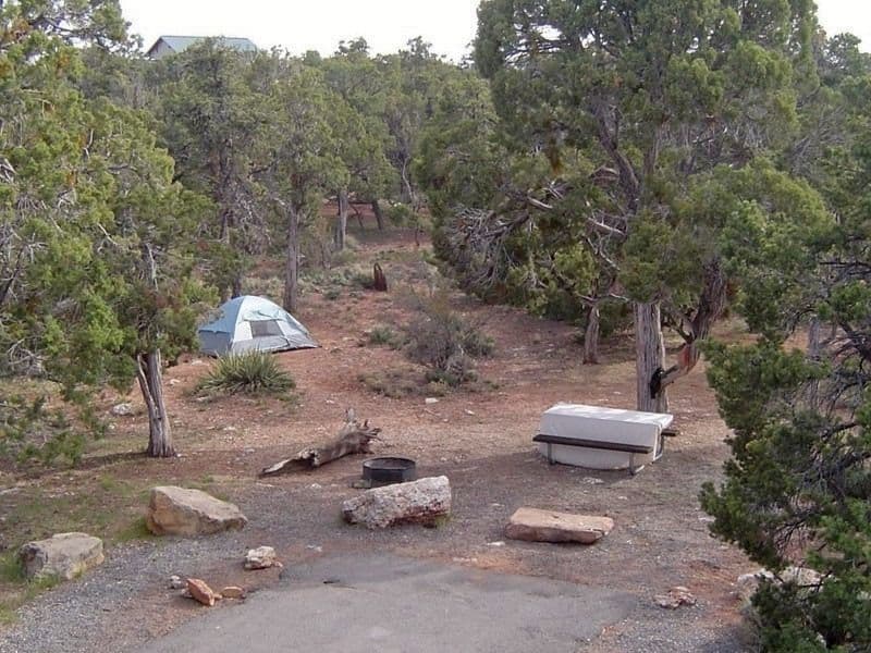 Campsite with tent, picnic table and fire ring at Desert View Campground, Grand Canyon South Rim