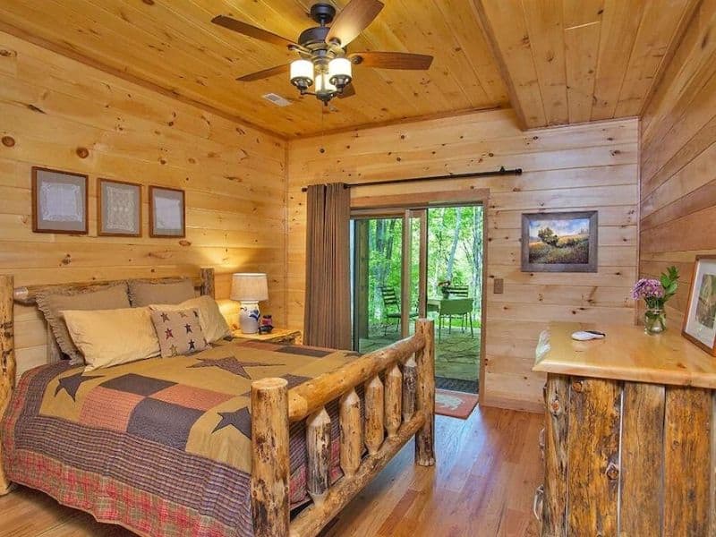 Upscale rustic bedroom in Hocking Hills vrbo rental