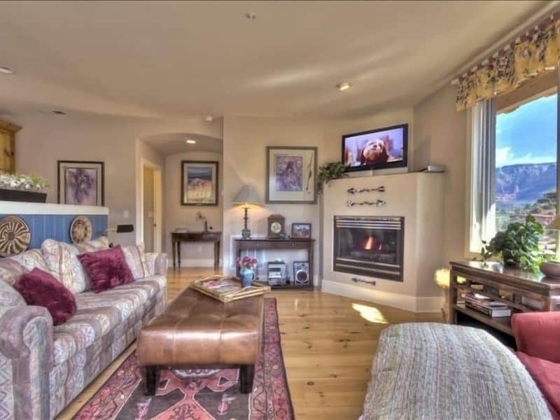 Living area with fireplace at Casa Cielo - Airbnbs in Sedona