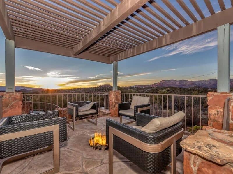 Outdoor patio and fire pit at Luxury Sedona Airbnb with Pool