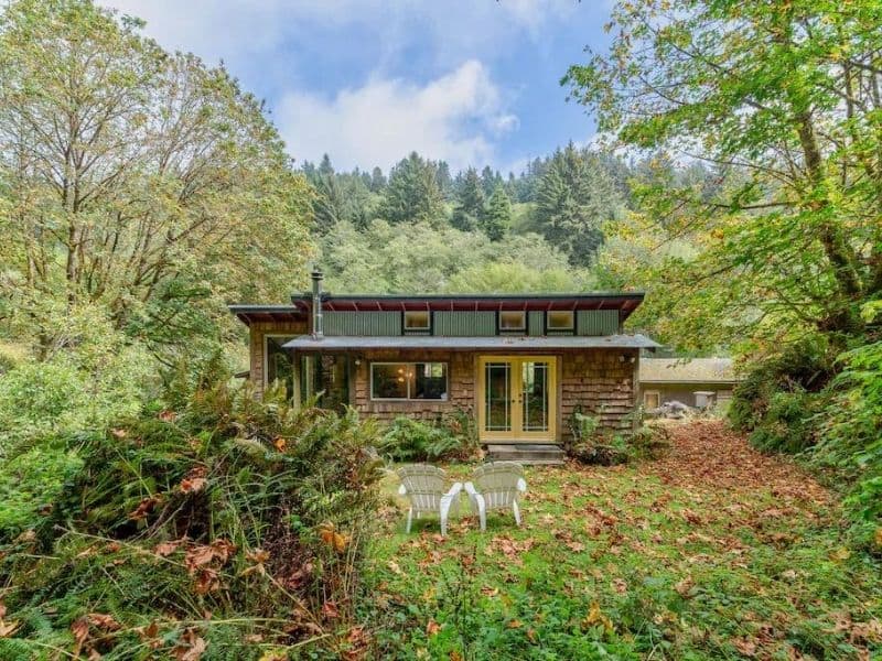 Cozy wood cabin with yellow doors near Redwood National and State Parks, CA.