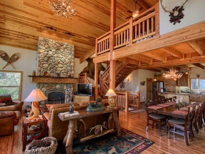 Living area and fireplace in popular Yosemite cabin rental.