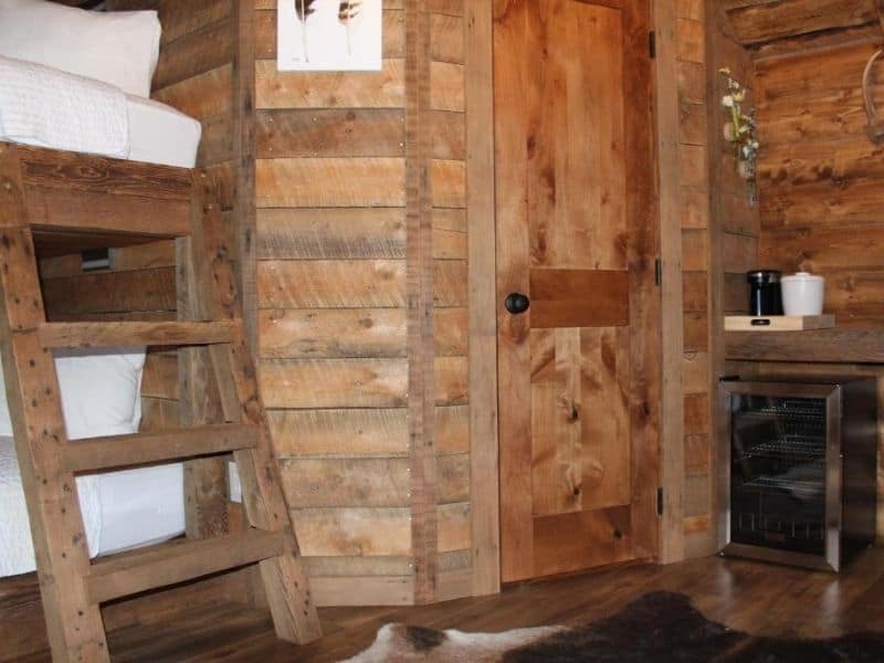 Bunk beds in cabin at Elkhorn Cabins and Inn in West Yellowstone - one of the best mid-range lodging options near the West Entrance