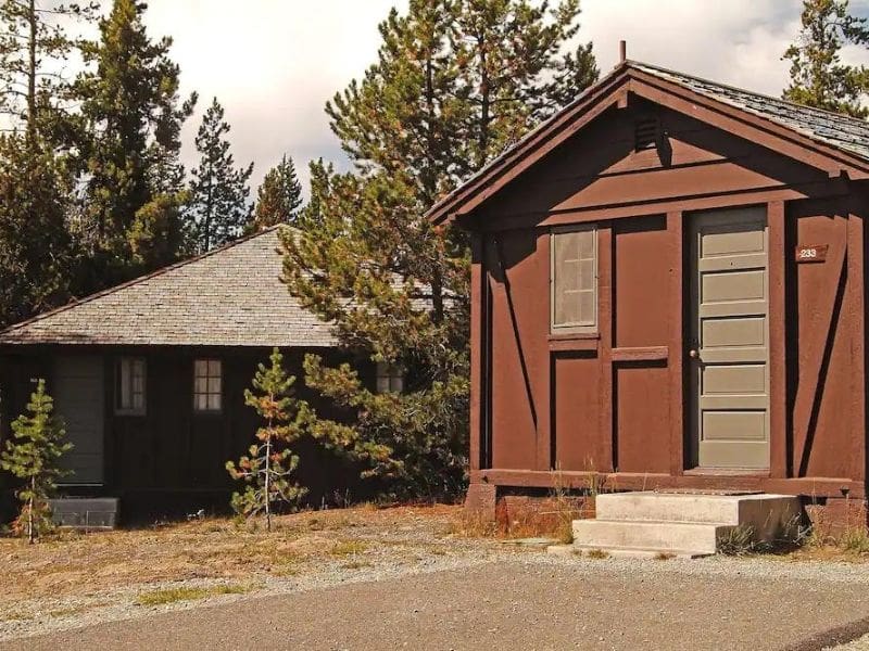 Rustic wood cabin exteriors at Old Faithful Lodge Cabins in Yellowstone National Park