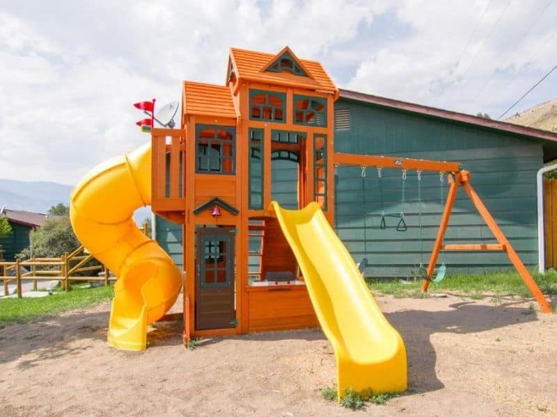 Playground with slides and swings at Yellowstone Gateway Inn in Gardiner, MT