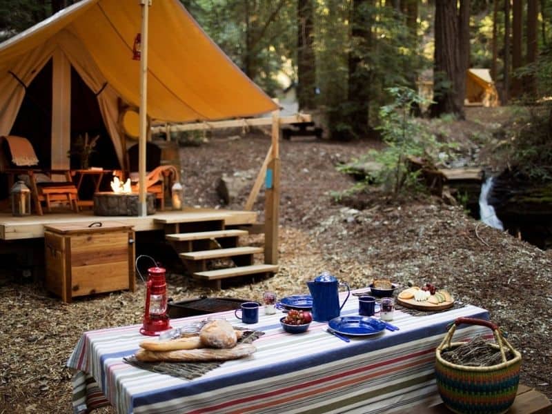 Glamping tent set up at Ventana Big Sur with picnic table