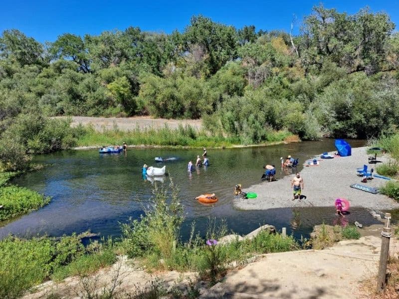People tubing on a river near Sonoma, CA