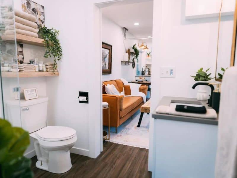 Bathroom and living area at tiny home vrbo near Hocking Hills, OH