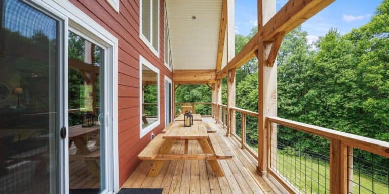 Large second-story deck with picnic table at pet-friendly cabin rental in Hocking Hills