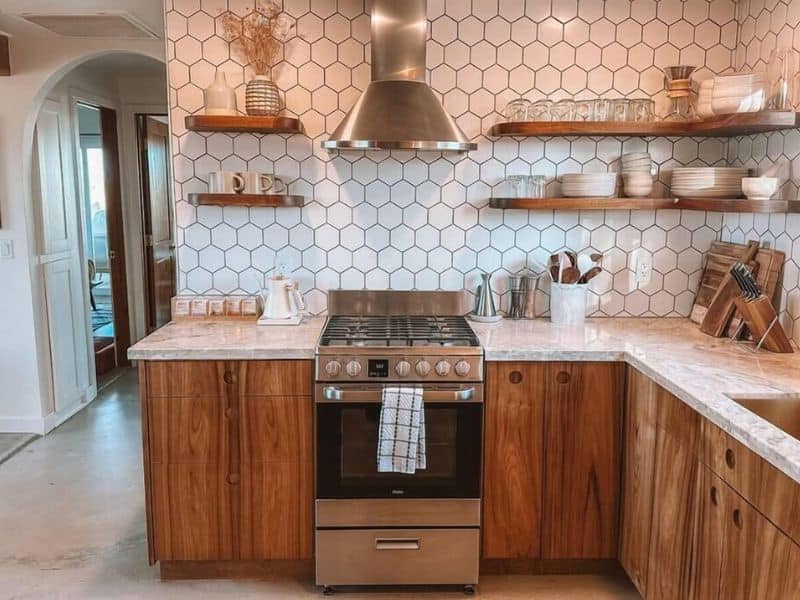 Retro Kitchen with geometric backsplash and dark wooden cabinets at Flamingo Social Club Vrbo in Joshua Tree