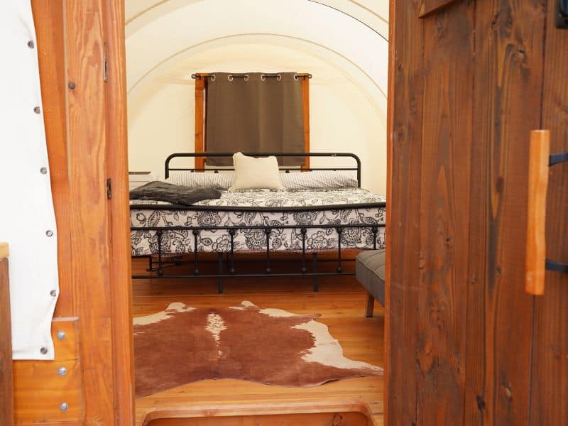 Interior of covered wagon unit at Zion View Camping - Zion National Park glamping