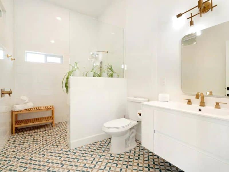 Beautiful modern bathroom with mosaic tiles and walk in shower at pretty Joshua Tree Vrbo