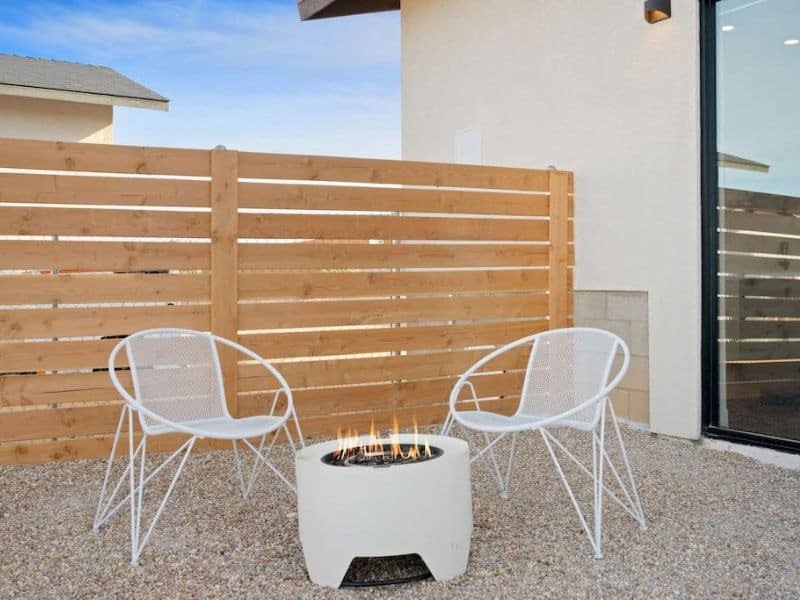 Outdoor seating and gas firepit at airbnb in Joshua Tree