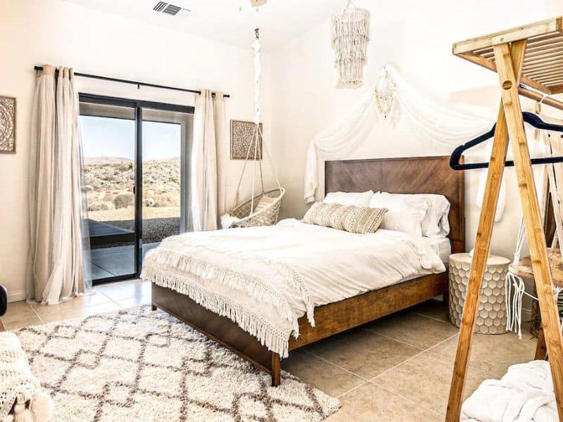 Boho-chic inspired bedroom at Joshua Tree Vrbo - Joshua Tree lodging