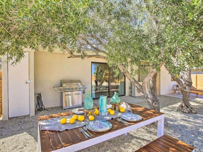 Outdoor dining under a tree at Joshua Tree airbnb lodging