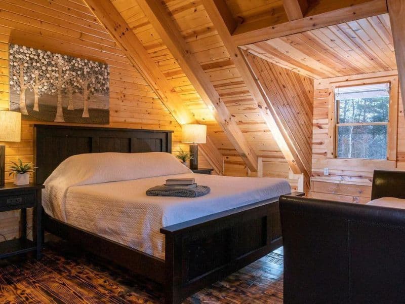 Cabin bedroom with vaulted ceilings