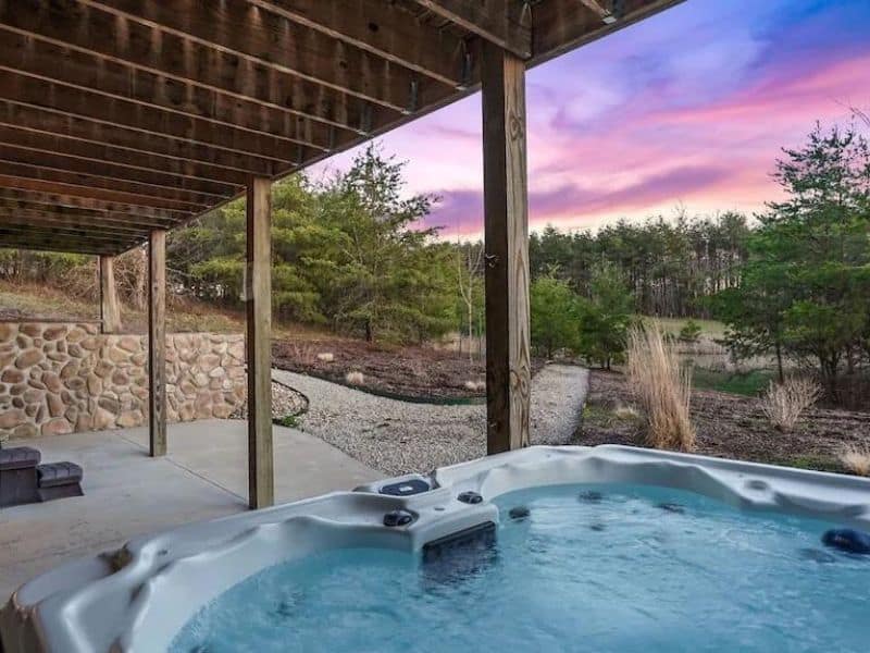 Covered hot tub at Hocking Hills cabin rental