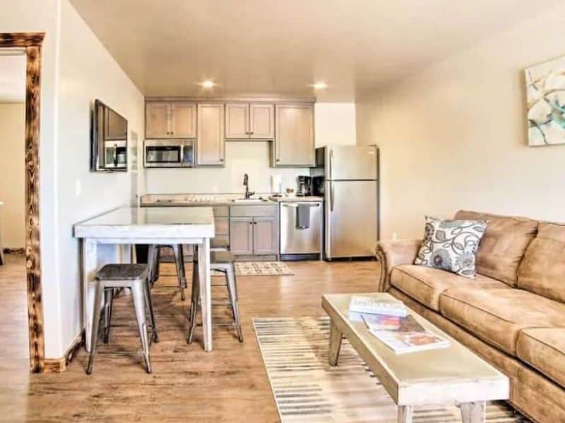 Small kitchen, dining area, and living area in Moab apartment at Angel Rock Rentals