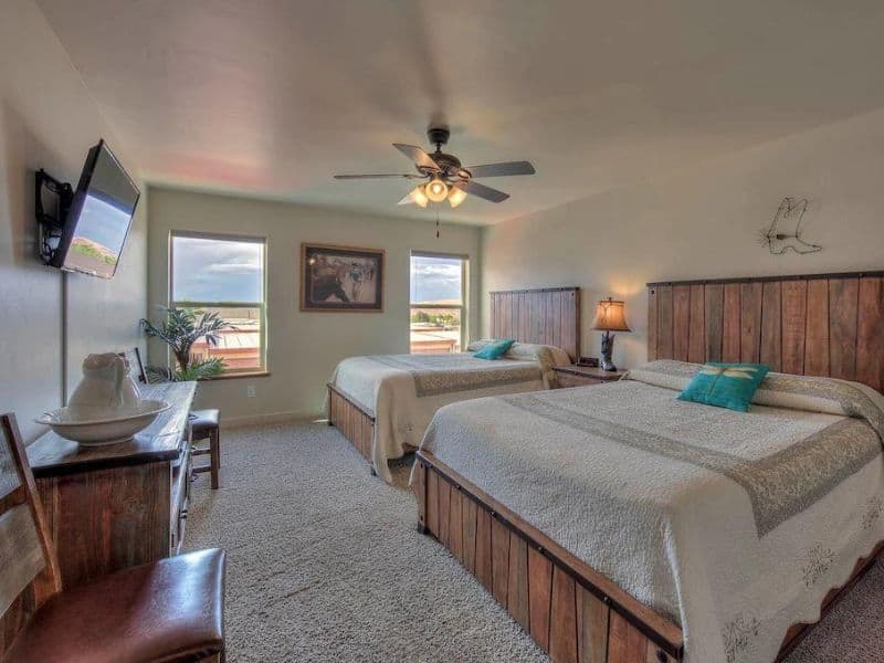 Double queen bedroom at cowboy-themed Moab airbnb