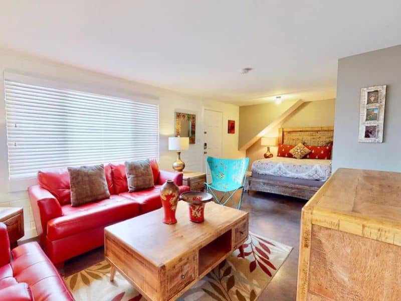Purple Sage Flat #6 in Moab Utah - 1 bedroom apartment sleeping up to 4 with red couch and bright design elements