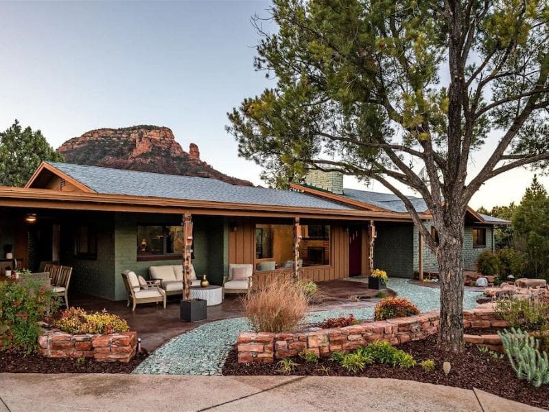 Exterior vacation home rental in Sedona with covered porch and manicured garden