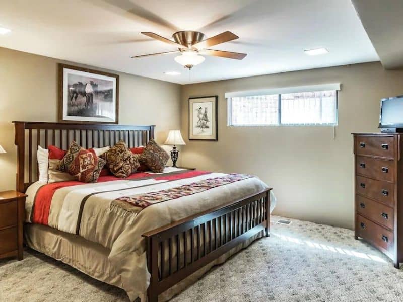 Bedroom with king bed and ceiling fan