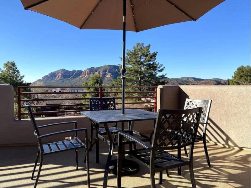 Balcony Dining area with mountain views of Sedona home.