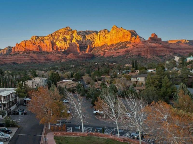 View of Uptown Sedona neighborhood with red rocks in the background