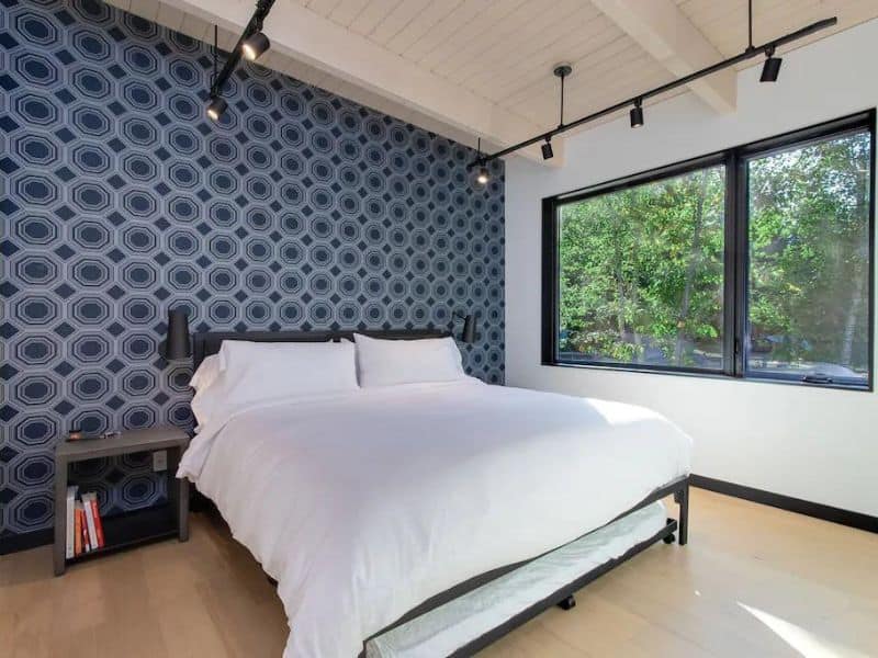 Simple bedroom with pattern wallpaper