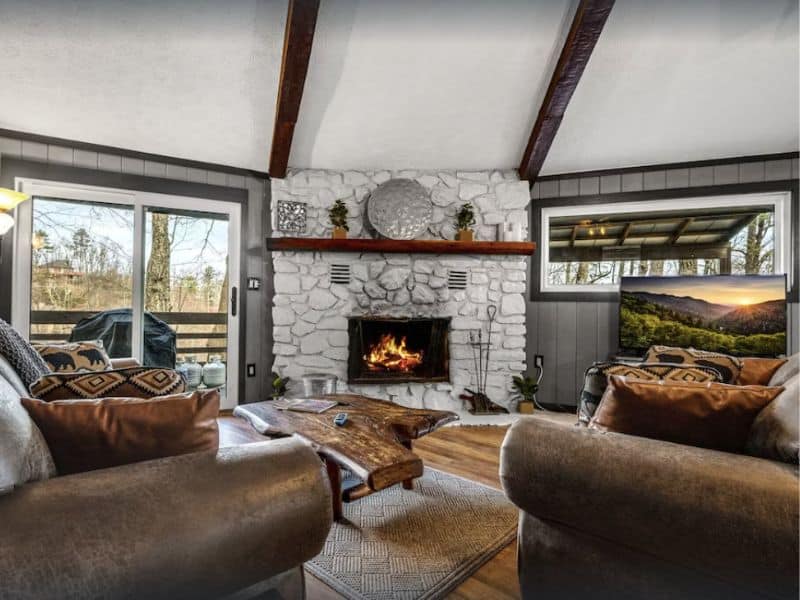 Cozy living area in Gatlinburg vacation rental with stone fireplace