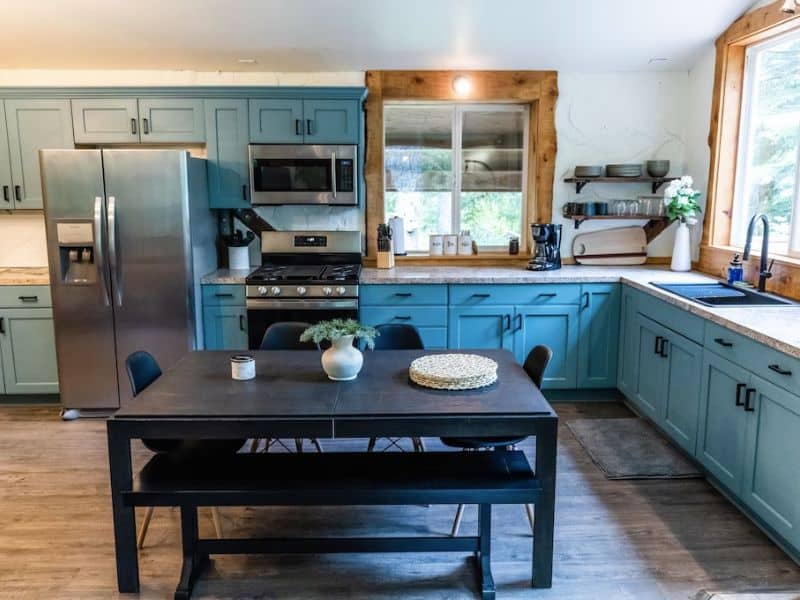 Modern farmhouse kitchen with aqua marine cupboards