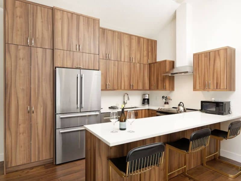 A kitchen in Aspen CO with wooden cabinets.