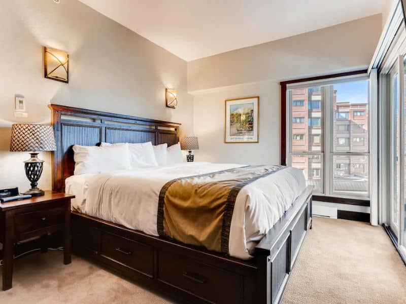 A bedroom in with a king size bed.