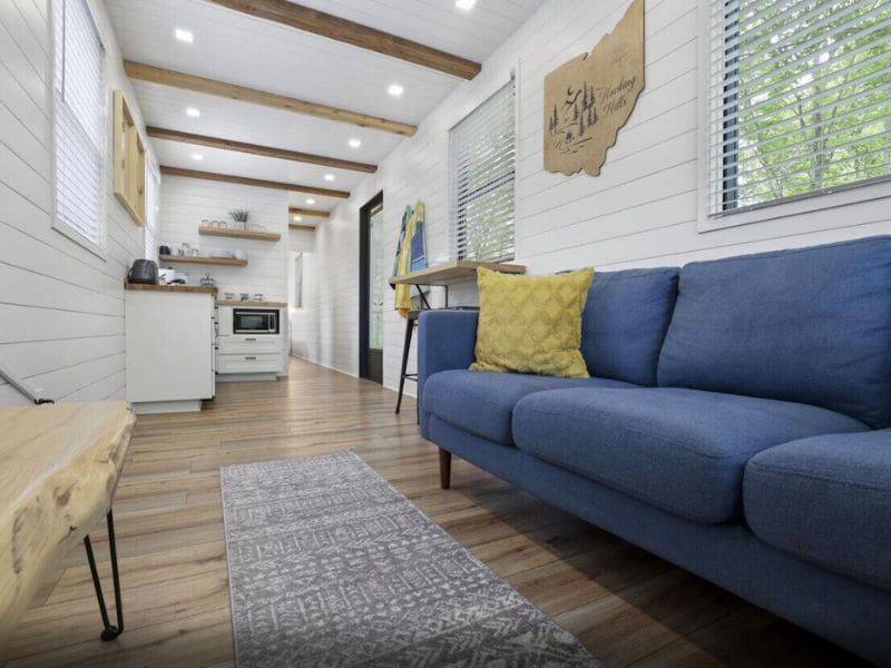 Luxury tiny house in Hocking Hills with a blue couch.