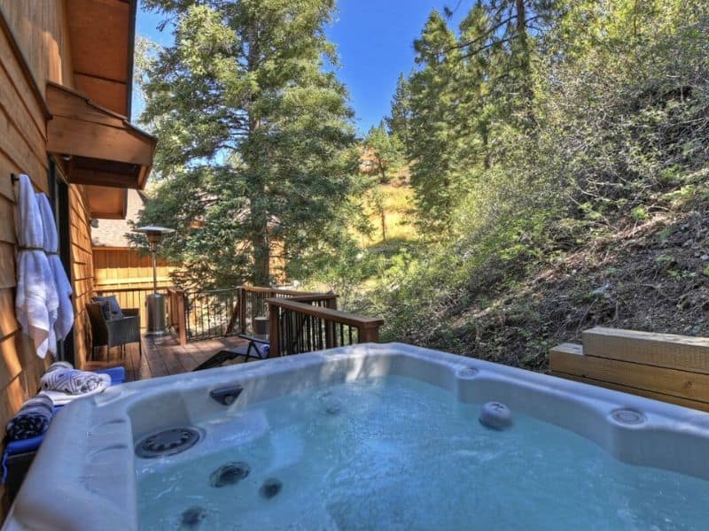A hot tub on the deck of a cabin in Big Bear, CA.