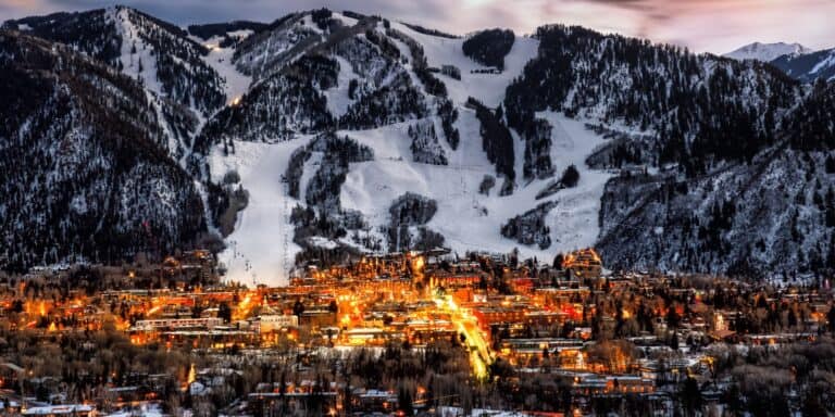 Aspen, Colorado lit up at dusk.