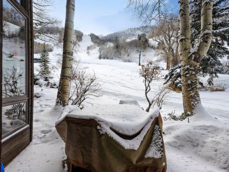 A snow covered patio in Aspen located at Shadow Mountain lift.