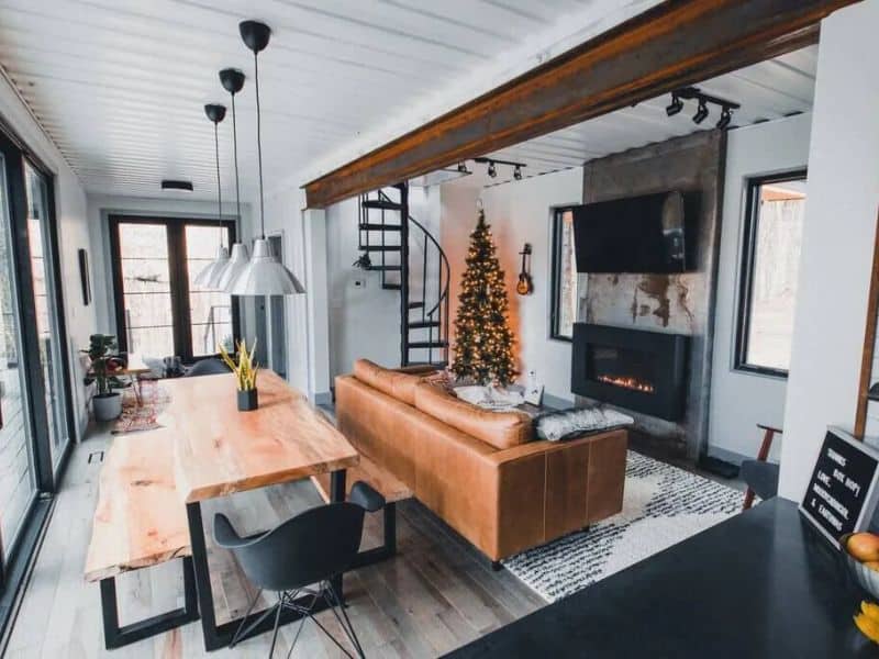 A container house with a living room and dining room in Hocking Hills.