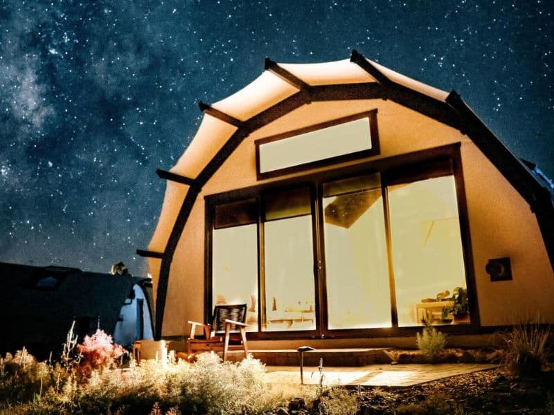 Backland luxury glamping tent suite under a starry night sky near the Grand Canyon.