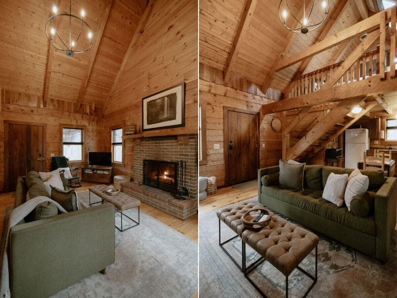 A warm, inviting living room with vaulted wooden ceilings, a stone fireplace, and comfortable seating. "The Hideaway" cabin rental in Hocking Hills.